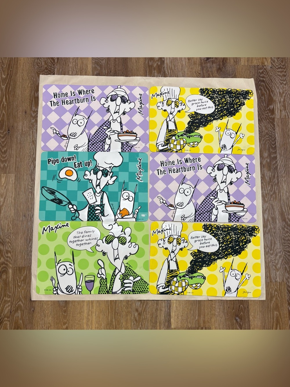Hallmark Maxine Cartoon Placemats in Purple, Yellow, Green, Teal